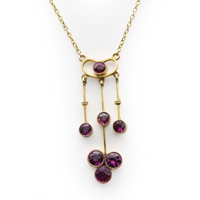 Lot 72 - A rhodolite garnet drop pendant