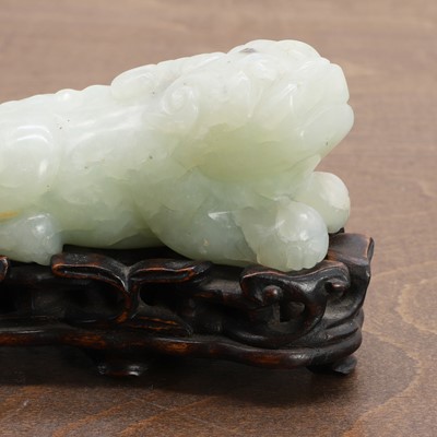 Lot 104 - A Chinese jade carving