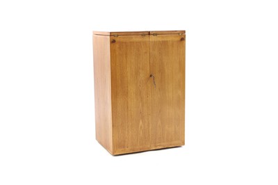 Lot 419 - A Heals folding drinks cabinet