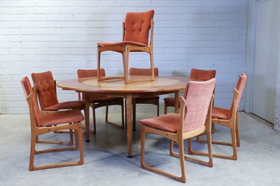 Lot 520 - A Danish teak dining suite