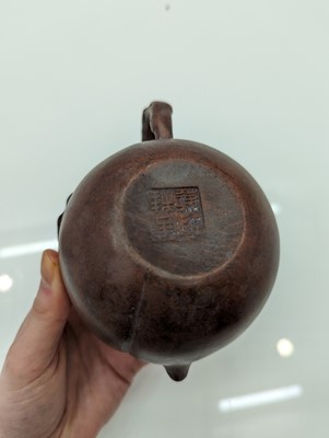 Lot 68 - A collection of four Chinese Yixing stoneware teapots