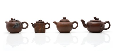Lot 68 - A collection of four Chinese Yixing stoneware teapots