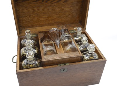 Lot 305 - An oak decanter chest