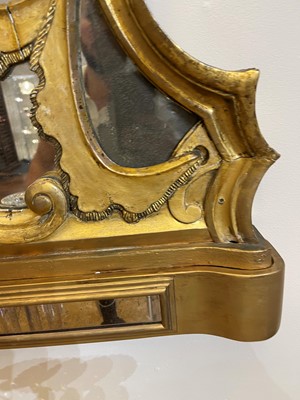 Lot 370 - A George III carved giltwood overmantel mirror