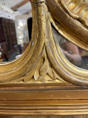 Lot 370 - A George III carved giltwood overmantel mirror