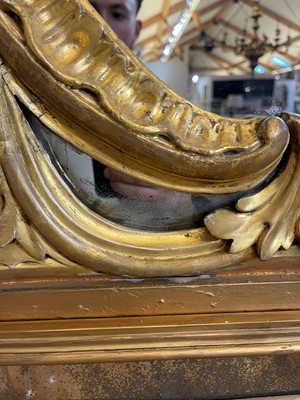 Lot 370 - A George III carved giltwood overmantel mirror