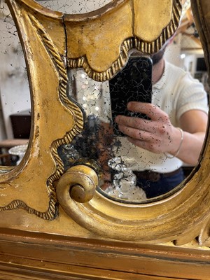 Lot 370 - A George III carved giltwood overmantel mirror