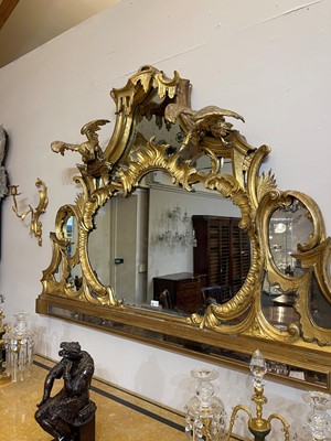 Lot 370 - A George III carved giltwood overmantel mirror