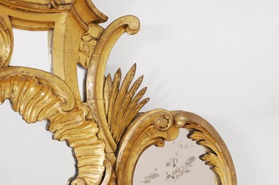 Lot 370 - A George III carved giltwood overmantel mirror