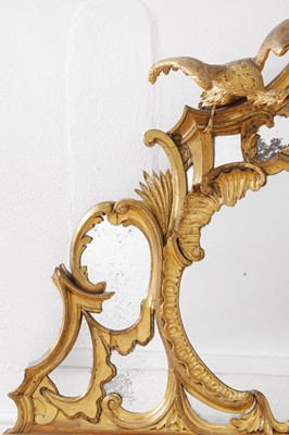 Lot 370 - A George III carved giltwood overmantel mirror