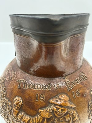 Lot 142 - A group of four salt glazed stoneware 'Harvest' jugs