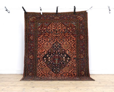 Lot 302 - A Kashan wool rug