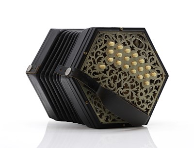 Lot 304 - An ebonised concertina