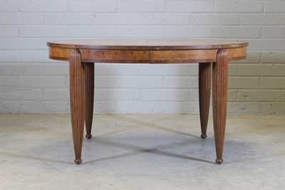 Lot 67 - A French Art Deco walnut and mahogany dining table