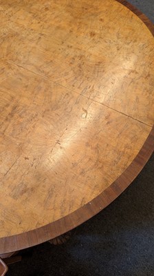 Lot 67 - A French Art Deco walnut and mahogany dining table