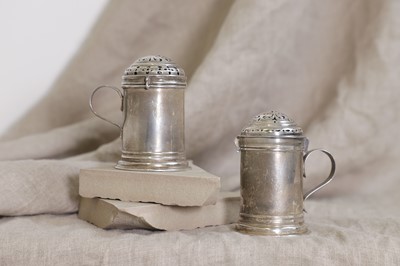 Lot 495 - A near pair of George I silver spice dredgers or shakers