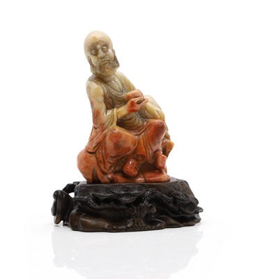 Lot 165 - A Chinese soapstone carving
