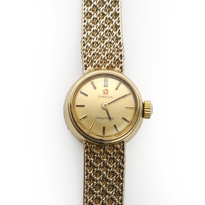 Lot 563 - A ladies' 9ct gold Omega Ladymatic automatic bracelet watch