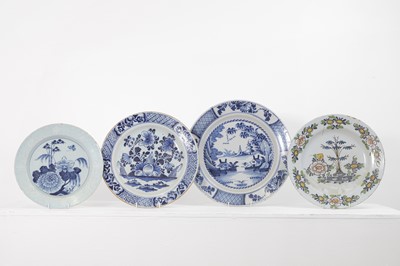 Lot 610 - A group of four large delft plates