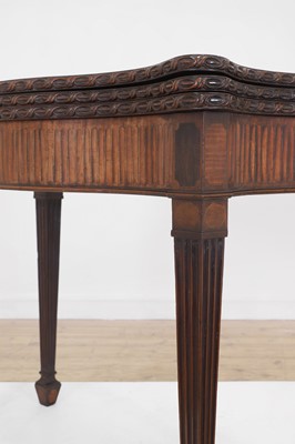 Lot 82 - A George III mahogany combination tea and card table