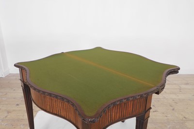 Lot 82 - A George III mahogany combination tea and card table