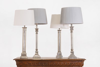 Lot 69 - Two pairs of polished metal table lamps