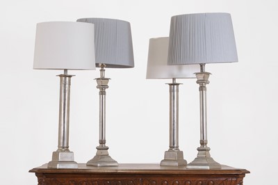 Lot 69 - Two pairs of polished metal table lamps