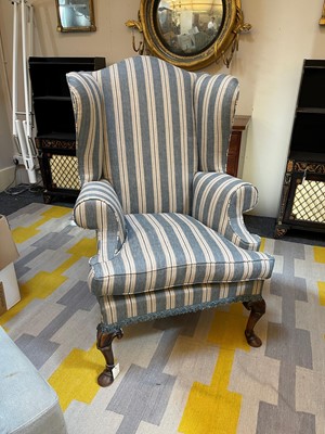 Lot 2 - A Queen Anne-style walnut wing-back armchair