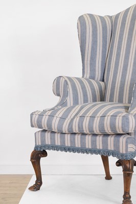 Lot 2 - A Queen Anne-style walnut wing-back armchair