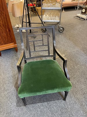 Lot 62 - An Aesthetic Period ebonised walnut elbow chair in the manner of E W Godwin