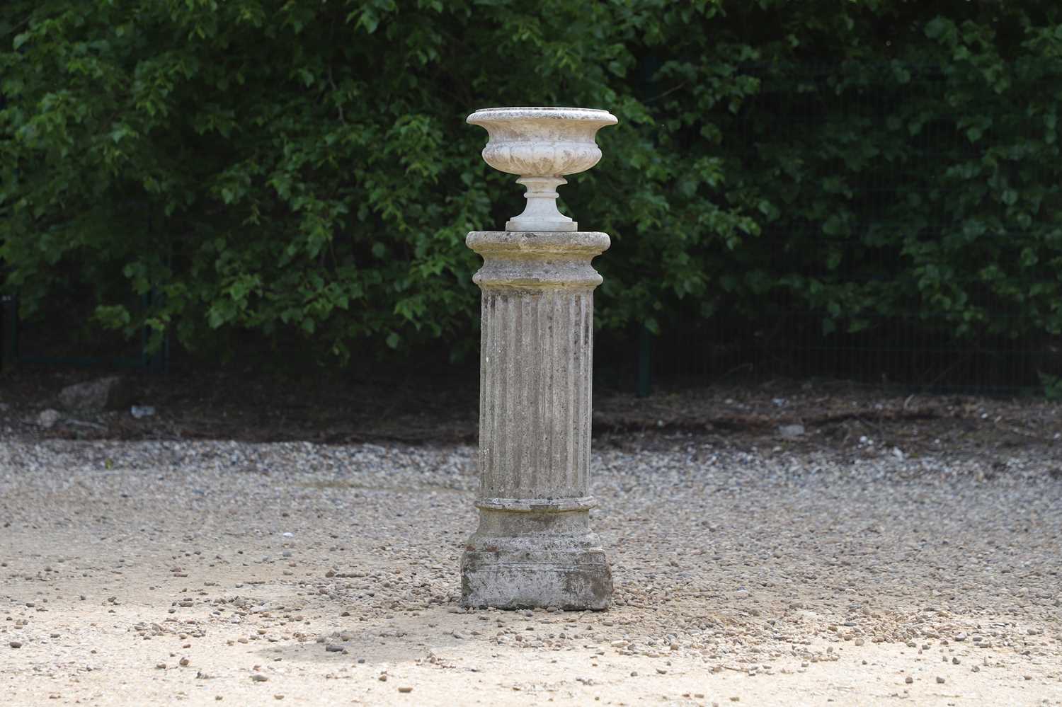 Lot 102 - A carved white marble urn