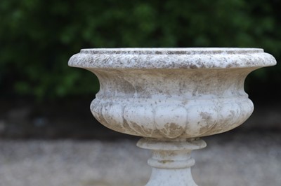 Lot 102 - A carved white marble urn