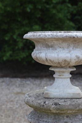 Lot 102 - A carved white marble urn