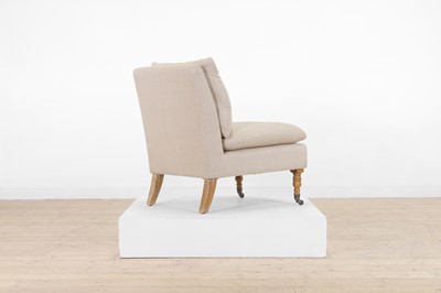 Lot 7 - An upholstered nursing chair by OKA