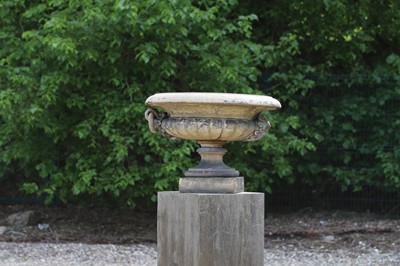 Lot 101 - A buff terracotta garden urn in the manner of J M Blashfield