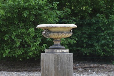 Lot 101 - A buff terracotta garden urn in the manner of J M Blashfield