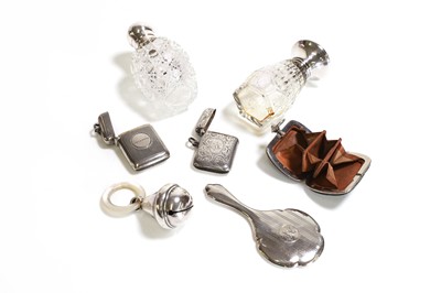 Lot 95 - A collection of silver novelty items