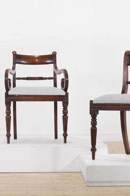 Lot 85 - A set of fourteen William IV-style mahogany dining chairs