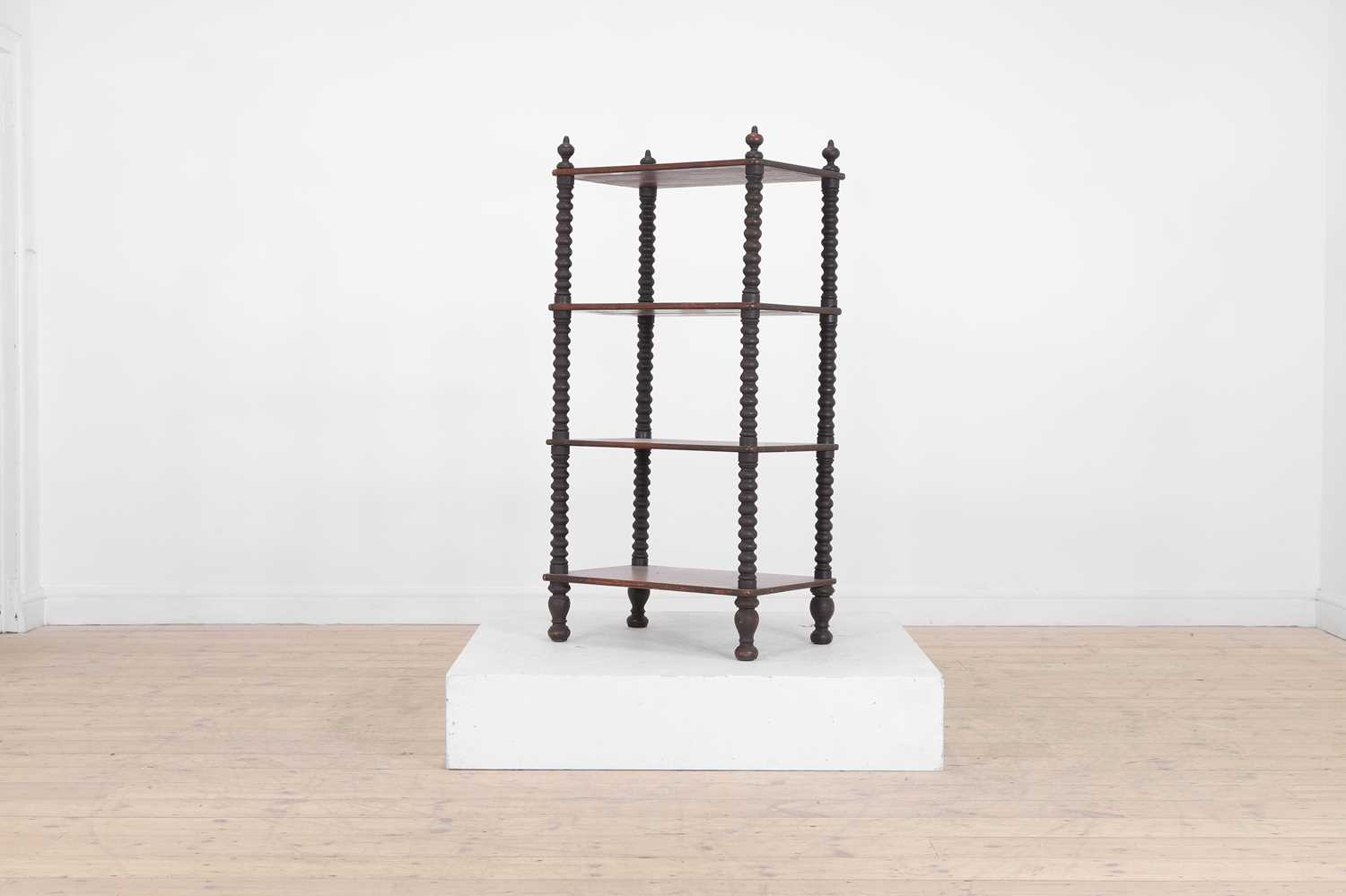 Lot 19 - A cherrywood etagere