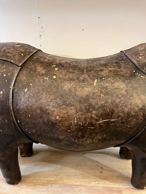 Lot 9 - A leather rhino footstool