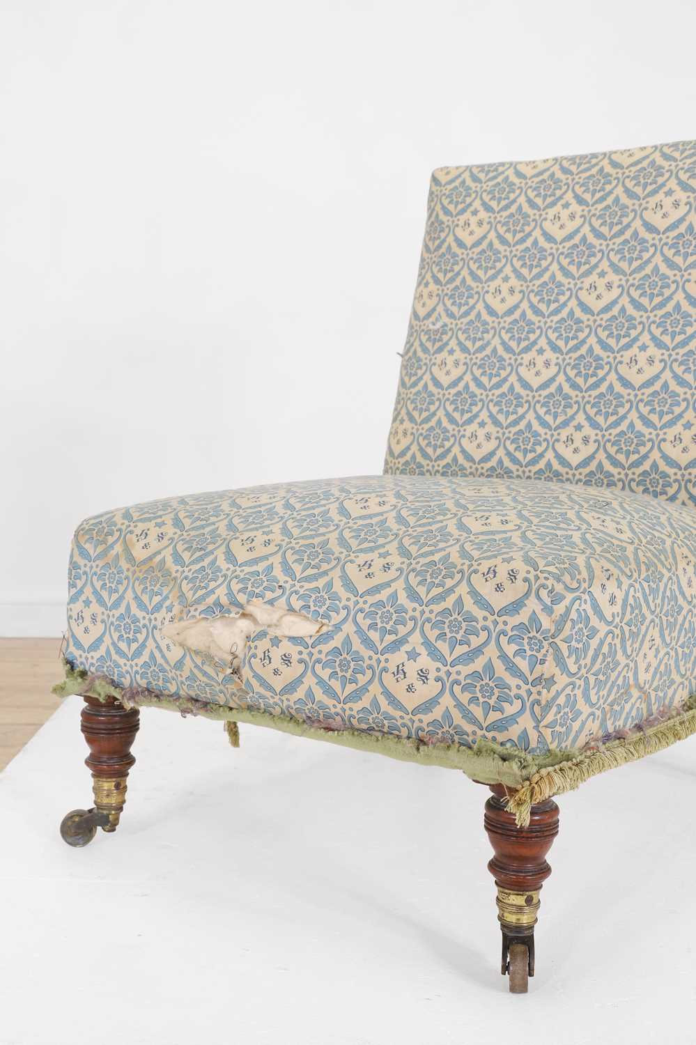 Lot 18 - A late Victorian nursing chair by Howard & Sons
