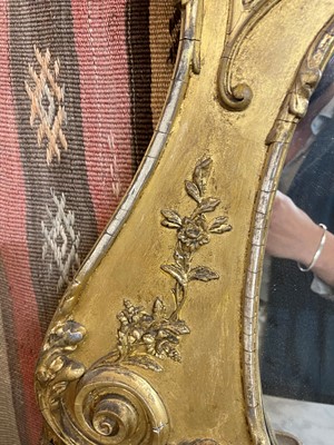 Lot 50 - A George III-style giltwood and gesso overmantel mirror