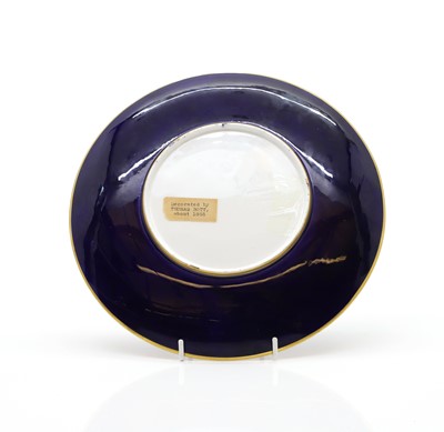 Lot 215 - A Royal Worcester porcelain 'Limoges enamel' cabinet plate