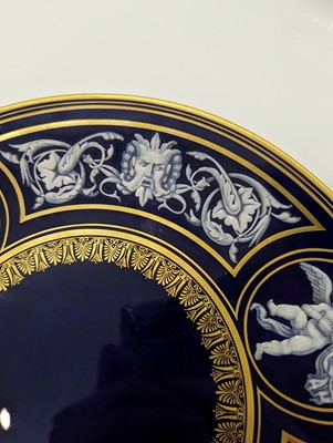 Lot 215 - A Royal Worcester porcelain 'Limoges enamel' cabinet plate