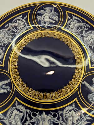 Lot 215 - A Royal Worcester porcelain 'Limoges enamel' cabinet plate