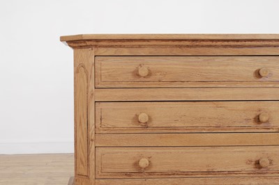 Lot 1 - A baroque-style stripped oak commode