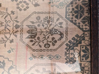 Lot 294 - A needlework sampler