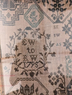 Lot 294 - A needlework sampler