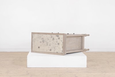 Lot 24 - A painted wooden and verre églomisé chest of drawers by OKA