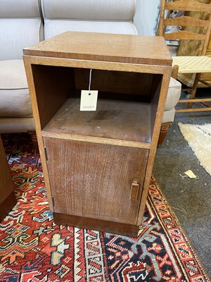 Lot 60 - A pair of limed oak bedside cupboards